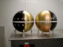 The spherical Pollux (left) and Castor satellites. [Photo courtesy of Naval Research Laboratory]