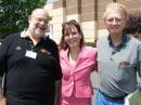 Reggie Leister, N3KAS (left), and Bob Rex, K3DBD (right) -- both members of the Pottstown Area Amateur Radio Club -- helped Philadelphia news reporter Lu Ann Cahn find out just why remote car door entry devices wouldn't work in the parking lot of a local department store.