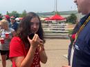 Jaylen Stoneburner,14, makes a contact with Carlos Ortiz, KD9OLN, parachute mobile at Hamvention. Steve Goodgame, K5ATA, serves as control operator.